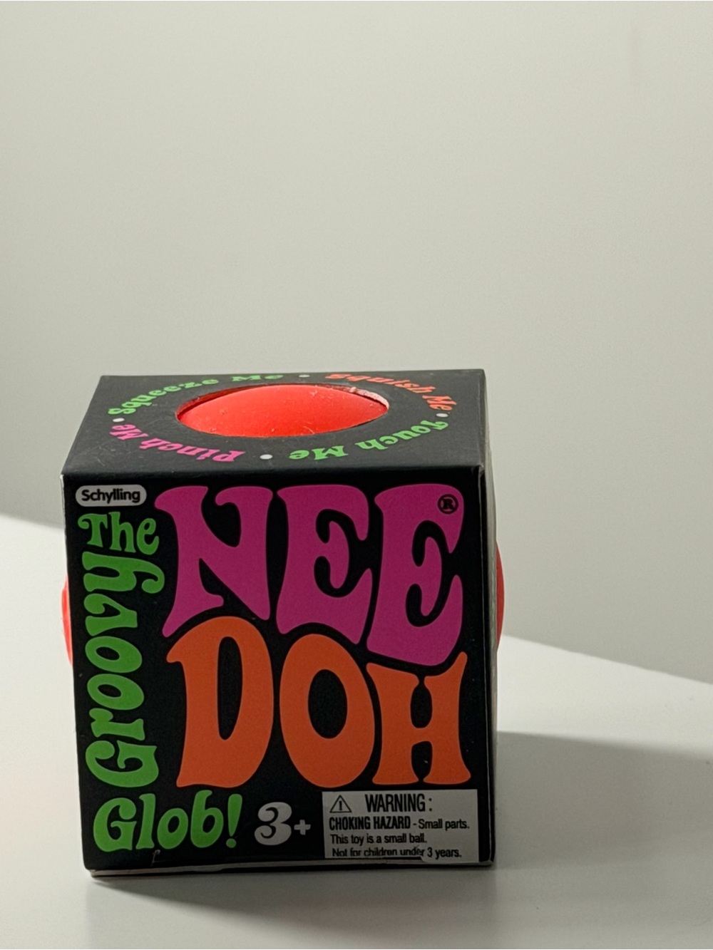 Groovy The NeeDoh Glob! Squeezable Sensory Ball - Bright Pink & Orange